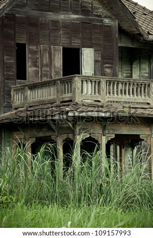 abandoned old house with grass in Thailand