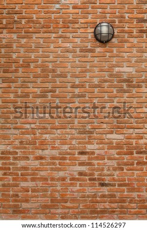 vintage wall lamp on brick wall background