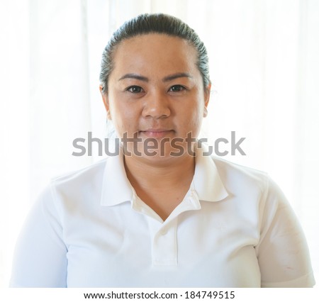 Close up of happy fatty asian woman