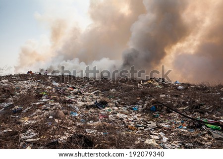 Burning garbage heap of smoke from a burning pile of garbage