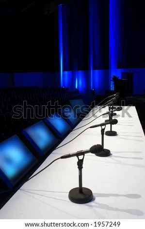 conference room with microphones on the table