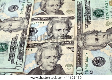 five 20 dollar bills arranged vertically and horizontally