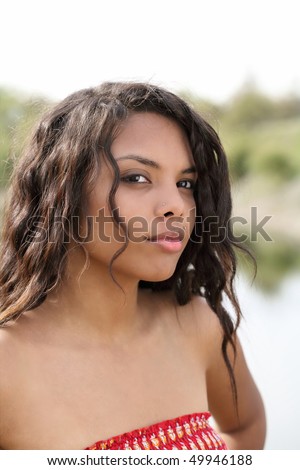 Pretty mixed ethnic teen girl outdoor portrait