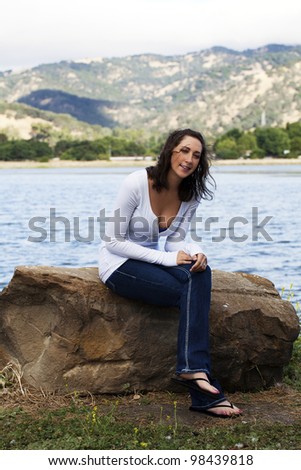 Young Woman Outdoors Jeans and Long Sleeved Top