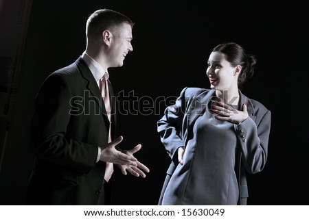 two business people at the meeting on black