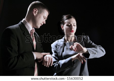 two business people at the meeting on black