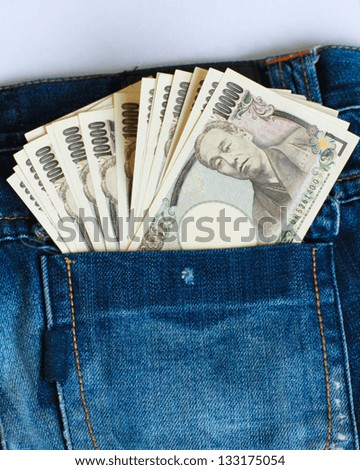 Japanese Yen Notes in jeans back pocket