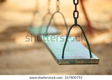 empty wood swing in the park