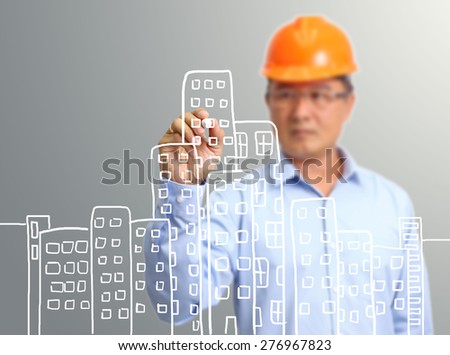 engineer hand draw construction site on the virtual screen