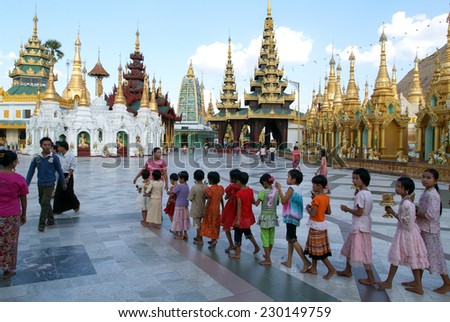 Yangon, Myanmar - 9 January 2010: People queued with offers in the area of the Shwedagon Pagoda in Yangon on Myanmar