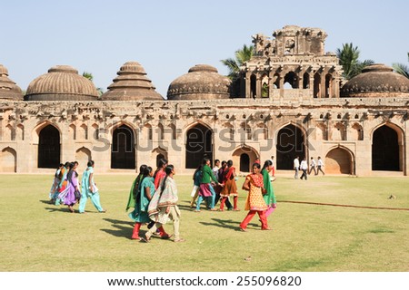 Hampi, India - 12 January 2015: People walking in front of Elephant Stables at Royal Centre on Hampi, India