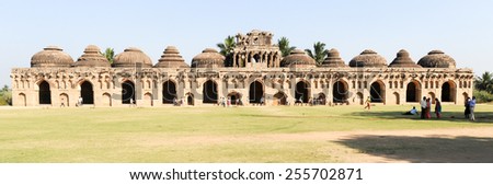 Hampi, India - 12 January 2015: People walking in front of Elephant Stables at Royal Centre on Hampi, India