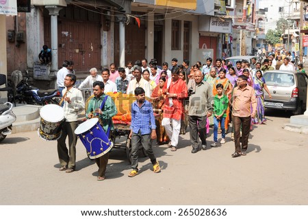 Maheshwar, India - 3 February 2015: A funeral procession proceeds through the streets of Maheshwar on India