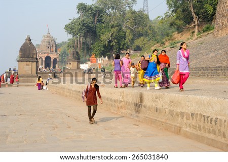 Maheshwar, India - 3 February 2015: Woman walking on the ghat of Maheshwar on India