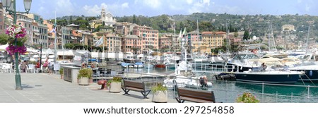 S.Margherita Ligure , Italy - 9 July 2015: People eating and drinking on a restaurant at the promenade of S.Margherita Ligure, famous small town in Liguria, Italy near Portofino