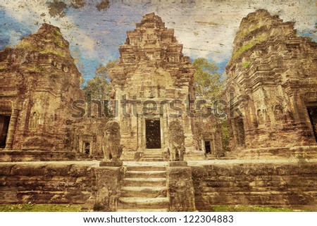 Ancient buddhist khmer temple in Angkor Wat complex in grunge and retro style, Cambodia