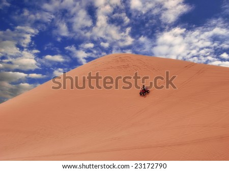 Quadrocycle on the dune. It is photographed on Pink Sands Dune. Utah. USA
