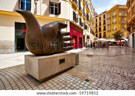 MALAGA - JULY 8: Sculpture of Chiromancer author Jose Seguiri made on the basis of drawings of Spanish painter Rafael P. Estrada on July 8, 2010 in the center of Malaga, Spain. Was opened in May 2001