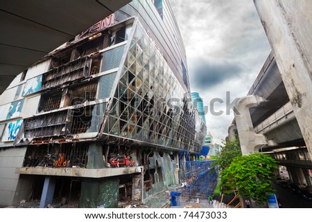 BANGKOK - JUNE 11: Fire damaged exterior of Central World Plaza shopping mall is seen in the aftermath of the anti government \'Red Shirt\' protest on June 11, 2010 in Bangkok, Thailand