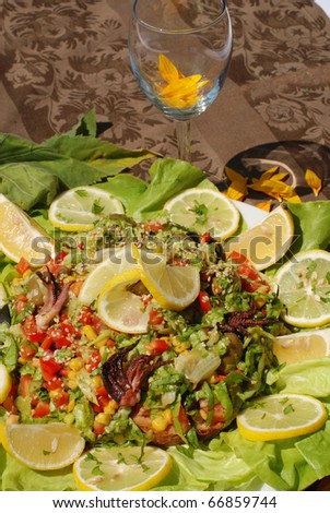 mixed fish salad with vegetables vegetable salad , healthy food concept