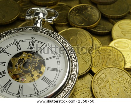 vintage hand watch and euro coins time is money