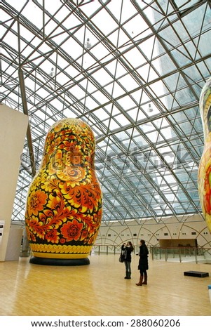 MOSCOW - JANUARY 4: Afimall on January 4, 2013 in Moscow, Russia. Exhibition of the giant Russian dolls - Matryoshka - in height from 6 to 13 meters in Shopping complex Afimall City.