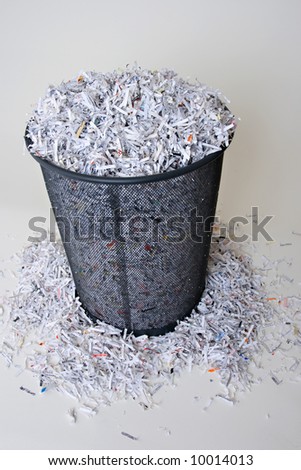 Shredded Paper in and around the basket