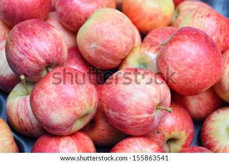 Group of red apples sale in the market