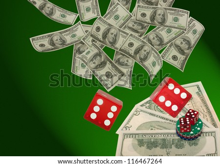 Falling money and dices on a poker table with dollars and chips