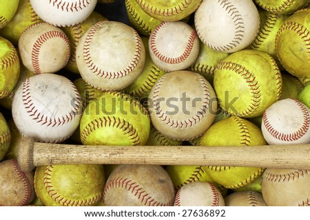 a picture of baseballs and softballs