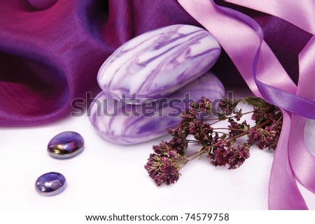 Purple aromatic soap with herbs and  decorative fabric