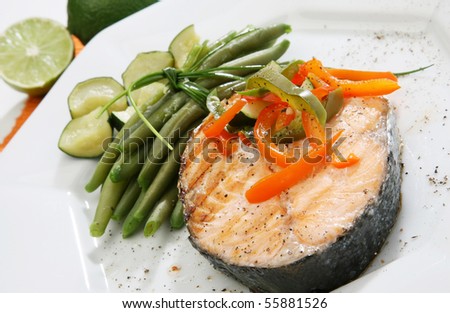 Salmon fish grilled with beans carrots  and pumpkins