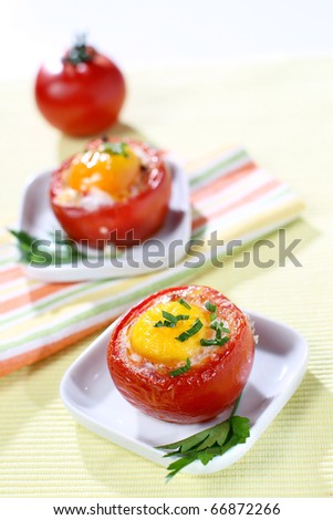 Fresh stuffed tomato with egg and parsley