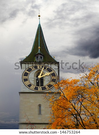 Clock tower of St. Peter\'s Church, Zurich, Switzerland.The steeple\'s clock face has a diameter of 8.7 m, the largest church clock face in Europe.