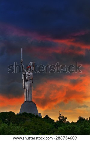 The view on Mother Motherland statue with poppy flowers on as a memory for the fallen people during the second world war