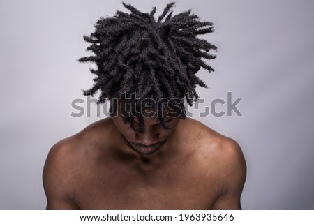 Similar – Image, Stock Photo Black man with dreadlocks looking at camera