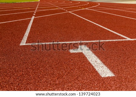 The beginning of the athletics track. the start of the athletics