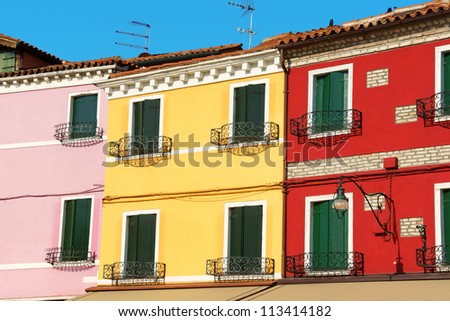 Renovated colorful houses in a row on Burano Island in the Venetian lagoon, Venice, Italy
