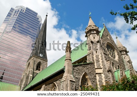 Christ Church Anglican Cathedral in Montreal and a modern skyscraper