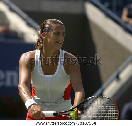 NEW YORK- JULY 19: Amelie Mauresmoin action against Maria Vento-Kabchi  July 18, 2004 in Flushing, NY. Amelie Mauresmo won the match to advance on in the 2004 US Open.