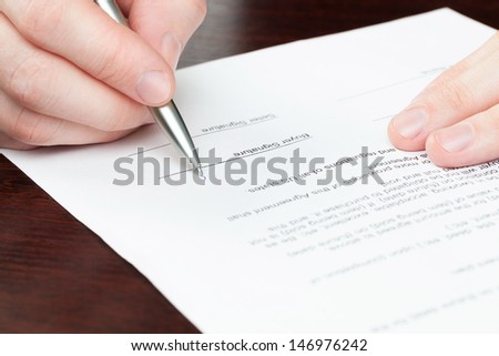 Financial world with business people - signing document