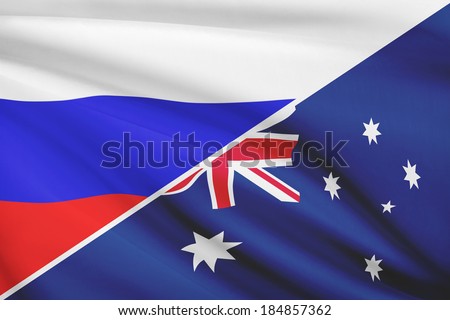Flags of Russia and Australia blowing in the wind. Part of a series.