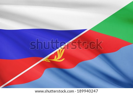 Flags of Russia and State of Eritrea blowing in the wind. Part of a series.