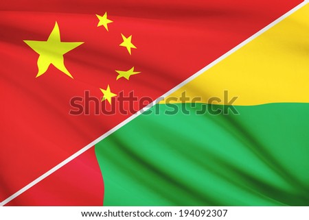 Flags of China and Republic of Guinea-Bissau blowing in the wind. Part of a series.