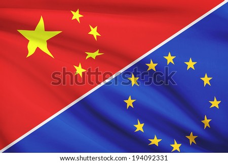 Flags of China and European Union blowing in the wind. Part of a series.