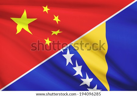 Flags of China and Bosnia and Herzegovina blowing in the wind. Part of a series.