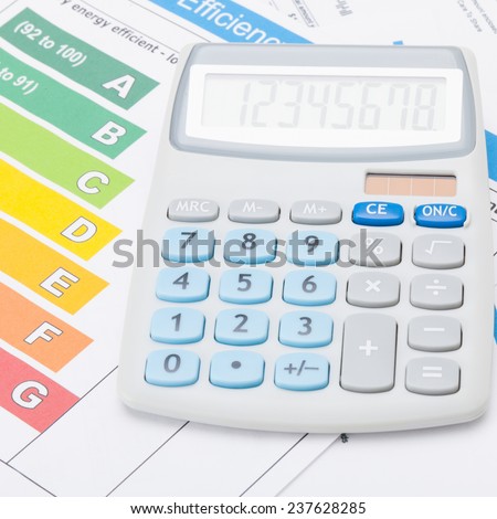 Calculator with energy efficiency chart - accounting concept