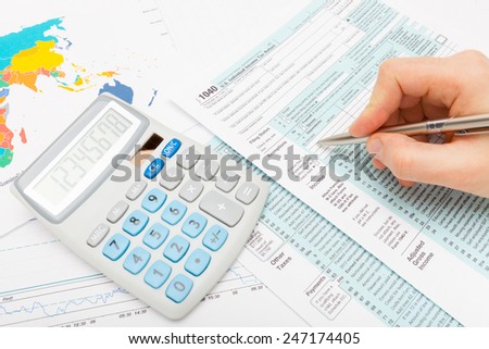 Male ready to fill out US 1040 Tax Form