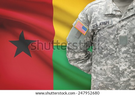 American soldier with flag on background - Republic of Guinea-Bissau