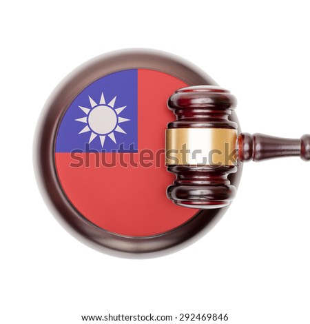 National legal system concept with flag on sound block  - Taiwan